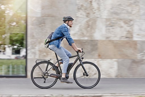 man on bicycle  with helmet